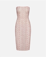 A MODEL POSES WEARING SKIMS SHORTS