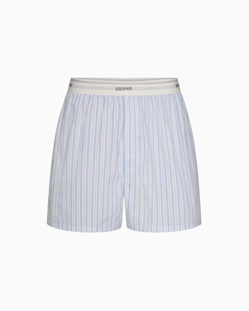 A MODEL POSES WEARING SKIMS MENS Boxers