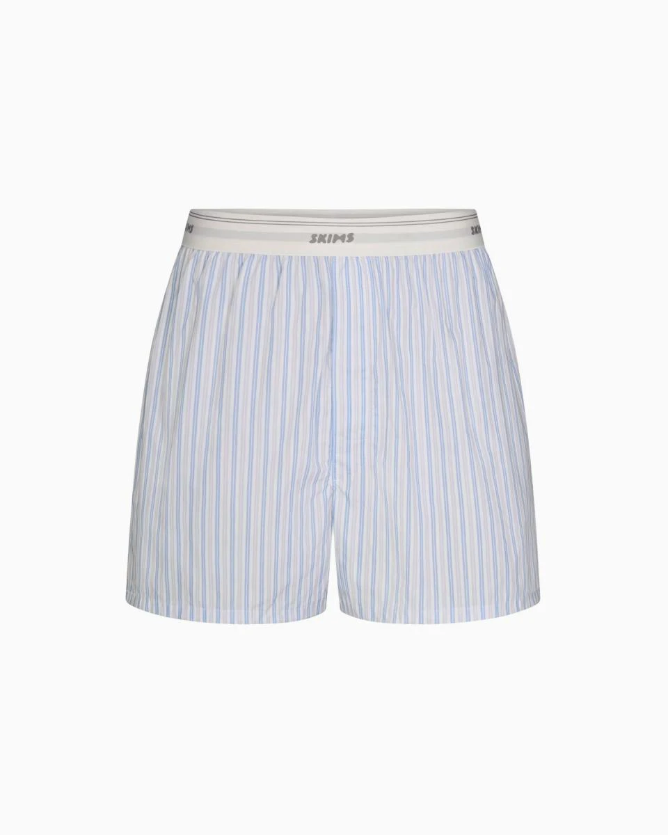 A MODEL POSES WEARING SKIMS MENS Boxers