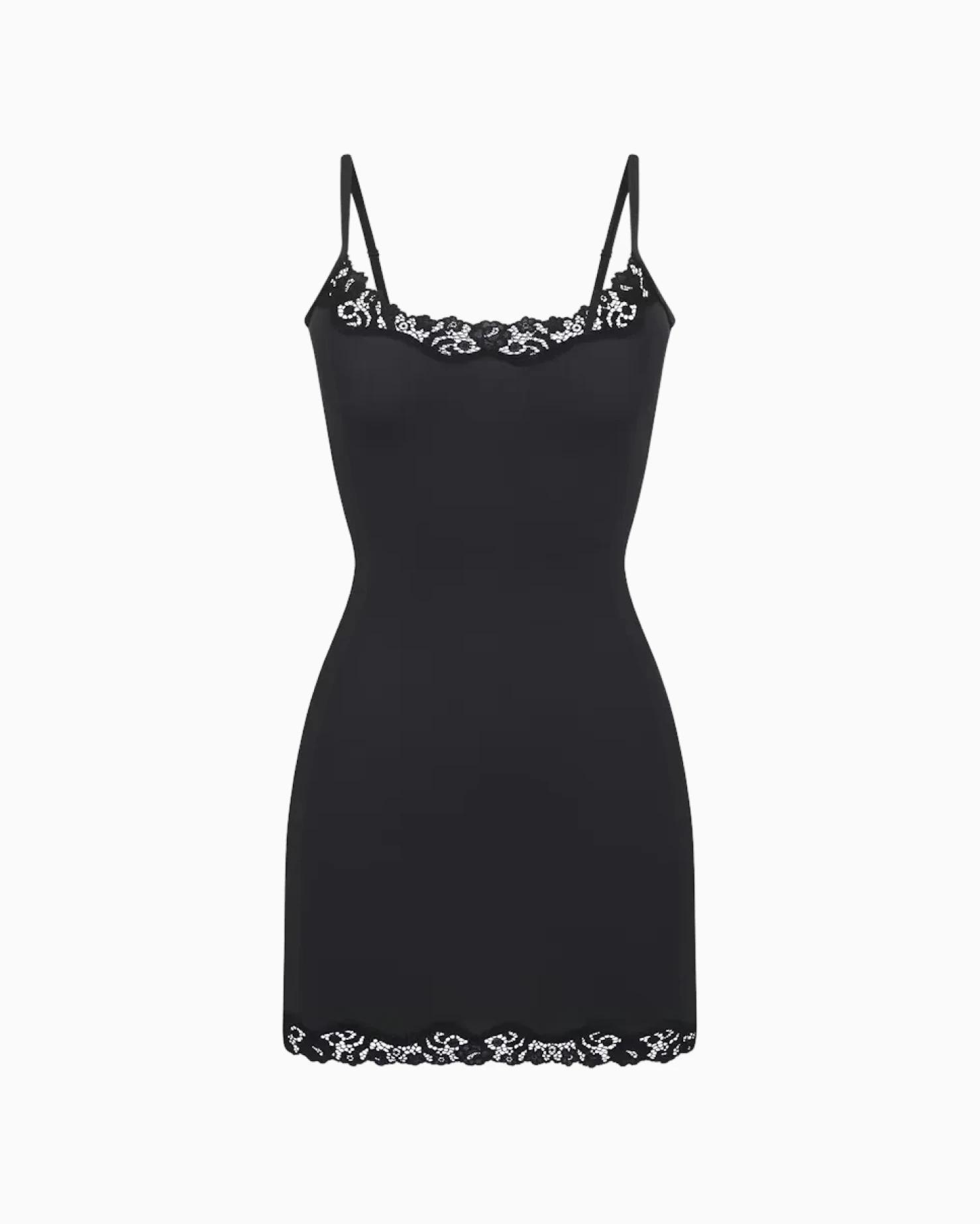 A MODEL POSES WEARING SKIMS LEGGINGS & PANTS