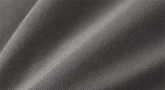 A FABRIC SWATCH OF SKIMS STRETCH