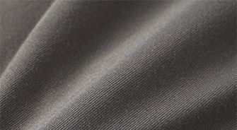 A FABRIC SWATCH OF SKIMS STRETCH 