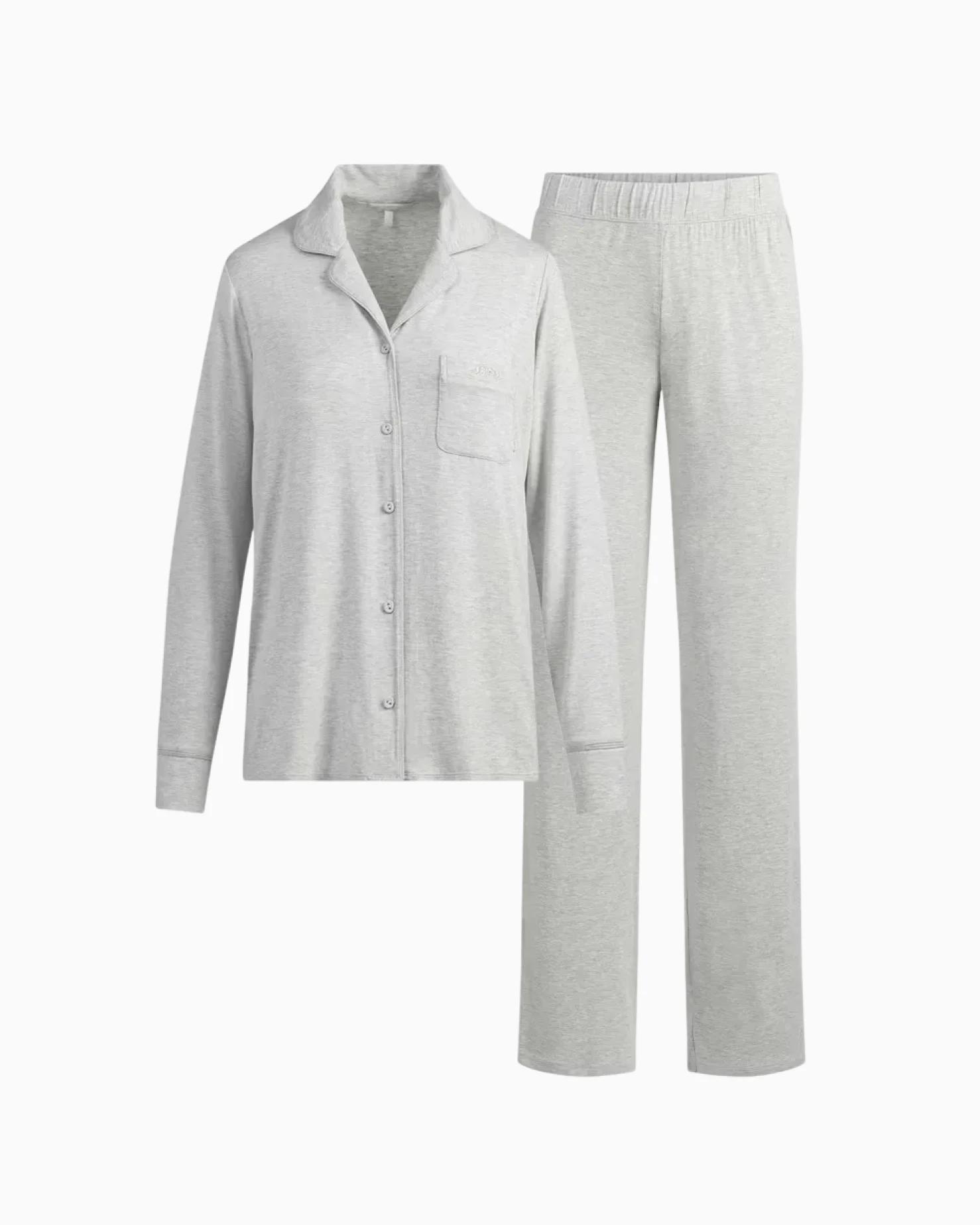 A model poses wearing SKIMS Pajamas